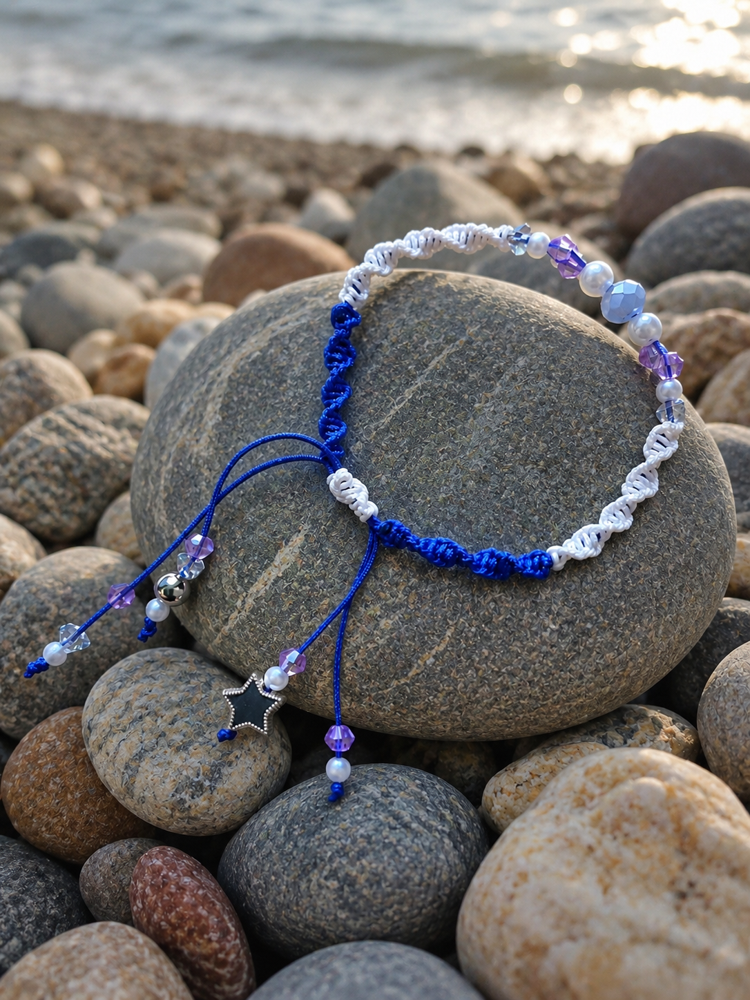 Two tone blue / white macrame bracelet with purple crystals and white pearl