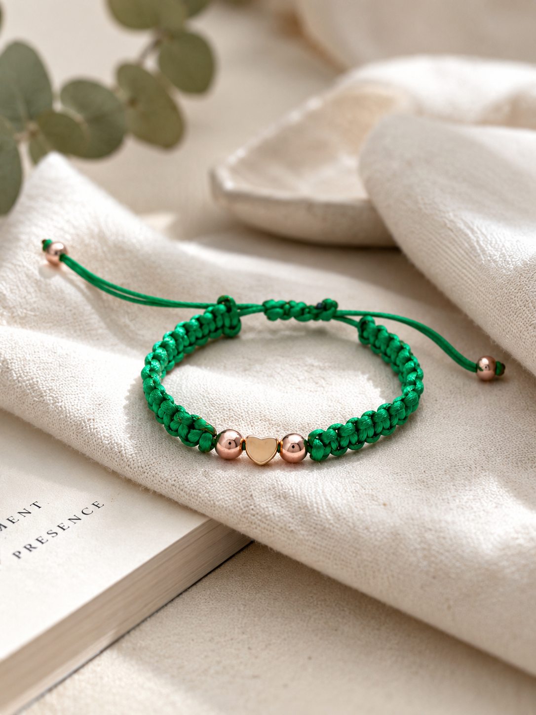 Green macrame , heart and gold tone bracelet