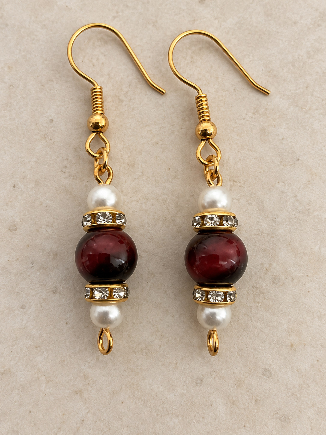 Red tigers eye drop earrings, gold tone