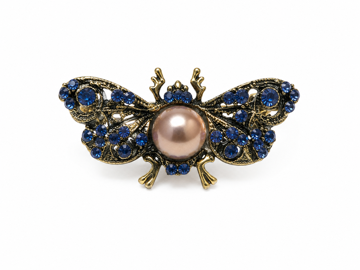 Moth antique style brooch with blue crystals