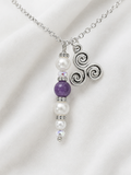 Amethyst pearl with  tresillian charm on silver tone chain