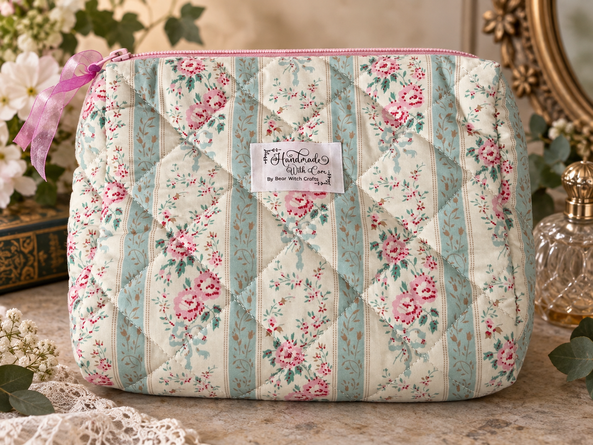 Quilted cosmetic bag with pink roses and blue bows